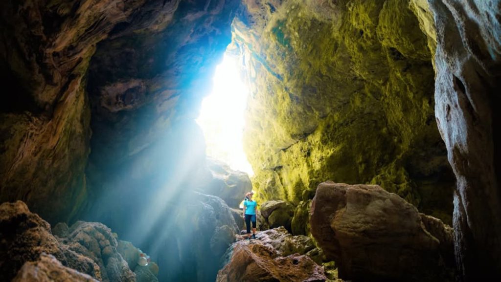 narrow limestone passage inside a cave near labuan bajo flores indonesia