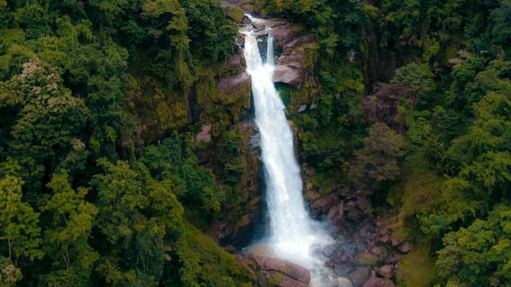 Cunca Lega Waterfall flowing strongly during the rainy season in Flores Indonesia
