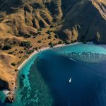 gili lawa island aerial view with turquoise bay and boats in Komodo National Park