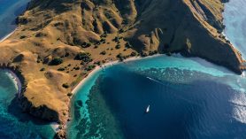 gili lawa island aerial view with turquoise bay and boats in Komodo National Park