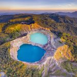 Kelimutu National Park crater lakes with changing colors at sunrise in Flores Indonesia