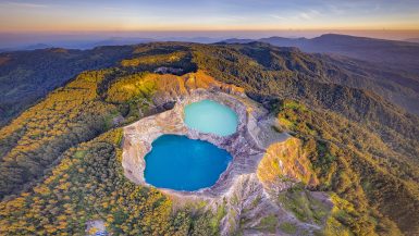 Kelimutu National Park crater lakes with changing colors at sunrise in Flores Indonesia