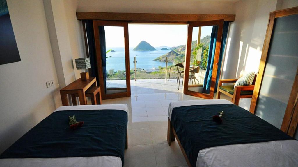 hotel room with ocean view overlooking labuan bajo islands