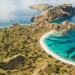 aerial view of pink beach in komodo national park with turquoise water