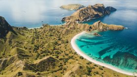 aerial view of pink beach in komodo national park with turquoise water