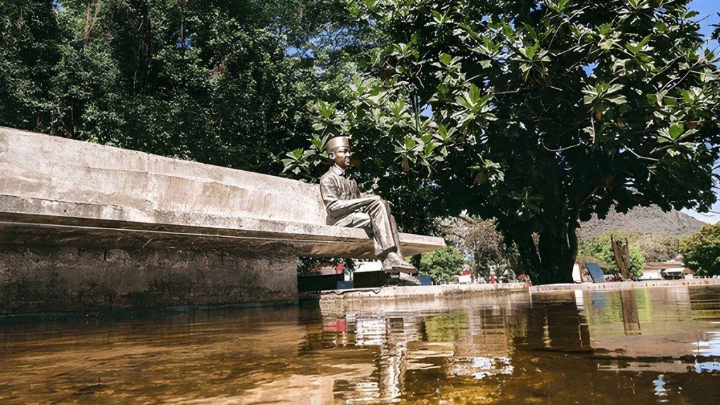 Bung Karno Contemplation Park in Ende Flores with surrounding trees and reflection pool near the city center