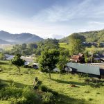scenic view of Moni Village surrounded by green highlands and rural landscape in Ende Flores Indonesia