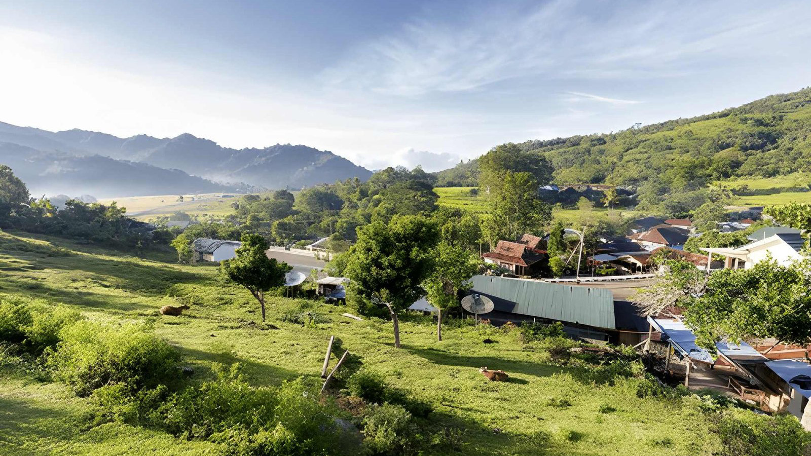 scenic view of Moni Village surrounded by green highlands and rural landscape in Ende Flores Indonesia